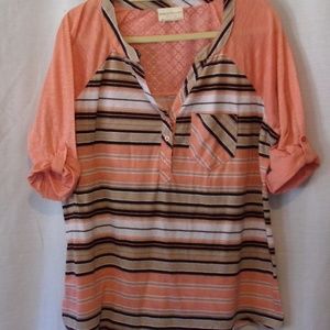 Peach and black striped blouse.